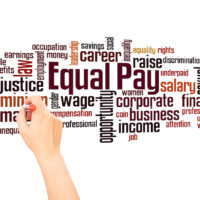 Equal pay word cloud and hand writing concept