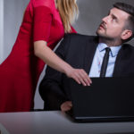 Female boss harrassing male employee Female boss harrassing male employee