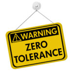 Warning sign that reads zero tolerance Warning sign that reads zero tolerance
