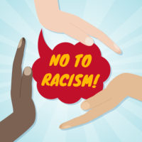 different color hands hovering a no to racism sign.jpg.crdownload