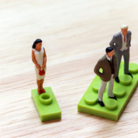 Woman on lego piece Woman on lego piece