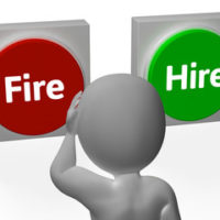 Buttons that read hire and fire Buttons that read hire and fire