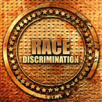 badge that reads race discrimination badge that reads race discrimination