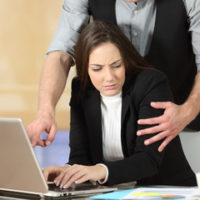 manager touching employee manager touching employee
