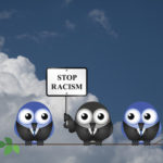 Owls holding racism sign Owls holding racism sign