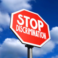 Stop discrimination stop sign