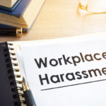 Documents about workplace harassment in an office. Documents about workplace harassment in an office.