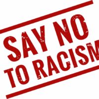 say no to racism red stamp