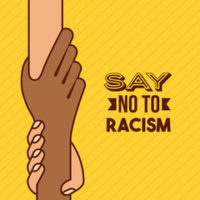 yellow sign that reads say no to racisim yellow sign that reads say no to racisim