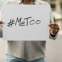 African American Woman Holding a #MeToo Sign