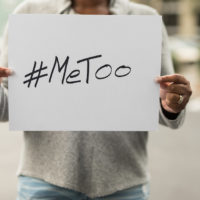 African American Woman Holding a #MeToo Sign African American Woman Holding a #MeToo Sign