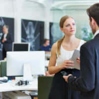 male boss talks down to female employee