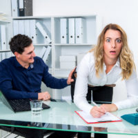 boss touches female employees butt while she's wide-eyed
