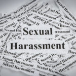 Pieces of paper that read sexual harassment Pieces of paper that read sexual harassment