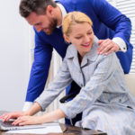 Boss touching female in sexual manner Boss touching female in sexual manner