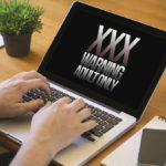 computer desktop that reads xxx warning adults only with hands computer desktop that reads xxx warning adults only with hands
