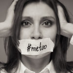 Black and white portrait of a girl glue her mouth with a white plaster with a hashtag me too because of the persecution. Concept of victim of sexual abusing Black and white portrait of a girl glue her mouth with a white plaster with a hashtag me too because of the persecution. Concept of victim of sexual abusing