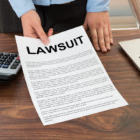 Lawyer Showing The Lawsuit Document Lawyer Showing The Lawsuit Document