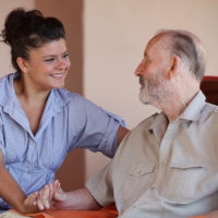 home health aide taking care of grandparent