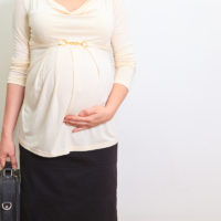 pregnant businesswoman getting ready to go to work pregnant businesswoman getting ready to go to work