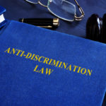 blue book that reads anti-discrimination law