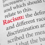 Definition of the word Racism in a dictionary