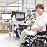 disabled employee working in workplace