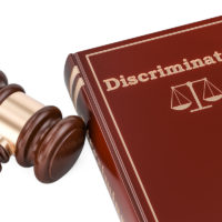Discrimination book with gavel