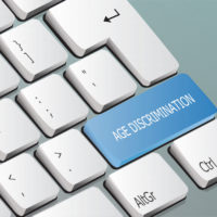 age discrimination blue key keyboard caption age discrimination blue key keyboard caption