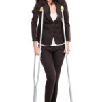 business woman with crutches