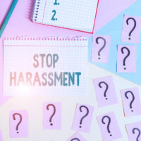 Text sign showing Stop Harassment. Conceptual photo Prevent the aggressive pressure or intimidation to others Mathematics stuff and writing equipment above pastel colours background.