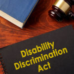 Book with title Disability Discrimination Act (DDA).