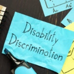 Disability Discrimination is shown on the conceptual business photo