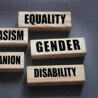 Equality no rasism, gender orientation disability words on wooden blocks. Social concept