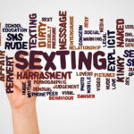 Sexting word cloud and hand with marker concept