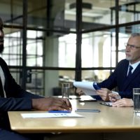 Employers rejecting back mans job application, racial discrimination concept Employers rejecting back mans job application, racial discrimination concept