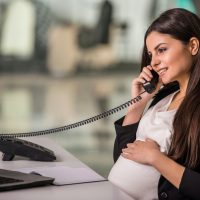 Pregnant businesswoman