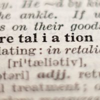 Dictionary definition of word retaliation, selective focus. Dictionary definition of word retaliation, selective focus.
