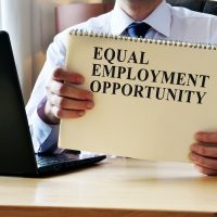 EEO equal employment opportunity. The manager shows the rules and guidelines.