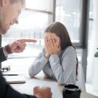 Rude young man point on brunette. She covers face with hands. Model afraid. Guy mad at her. He scream. she cry. Rude young man point on brunette. She covers face with hands. Model afraid. Guy mad at her. He scream. she cry.