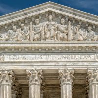Washington DC Supreme Court facade equal justice under the law on sunny day