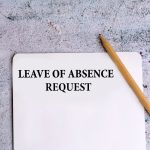 Leave of absence request and wooden pencil