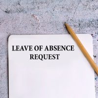 Leave of absence request and wooden pencil